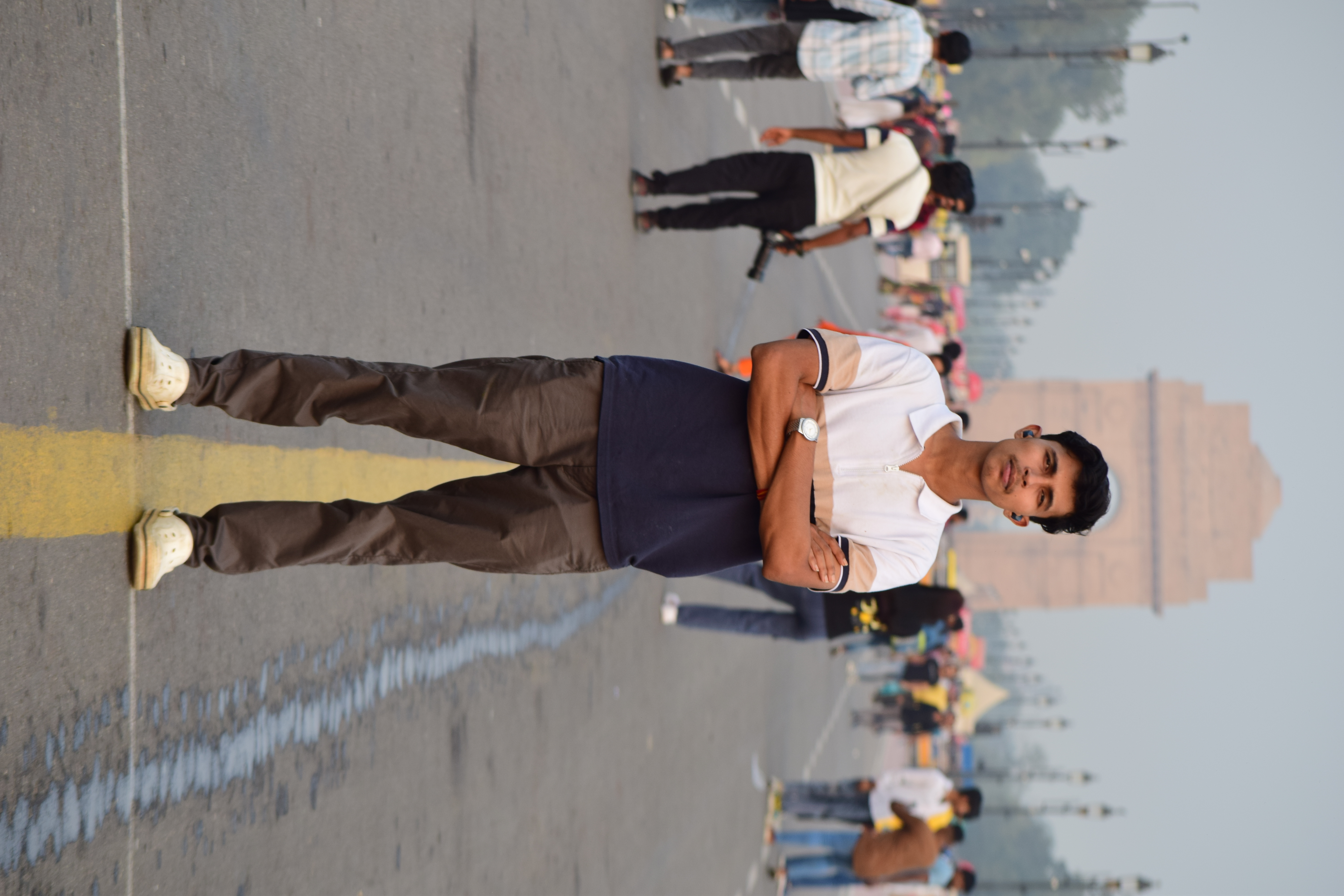 Ashish Alam Kabir standing in front of India Gate