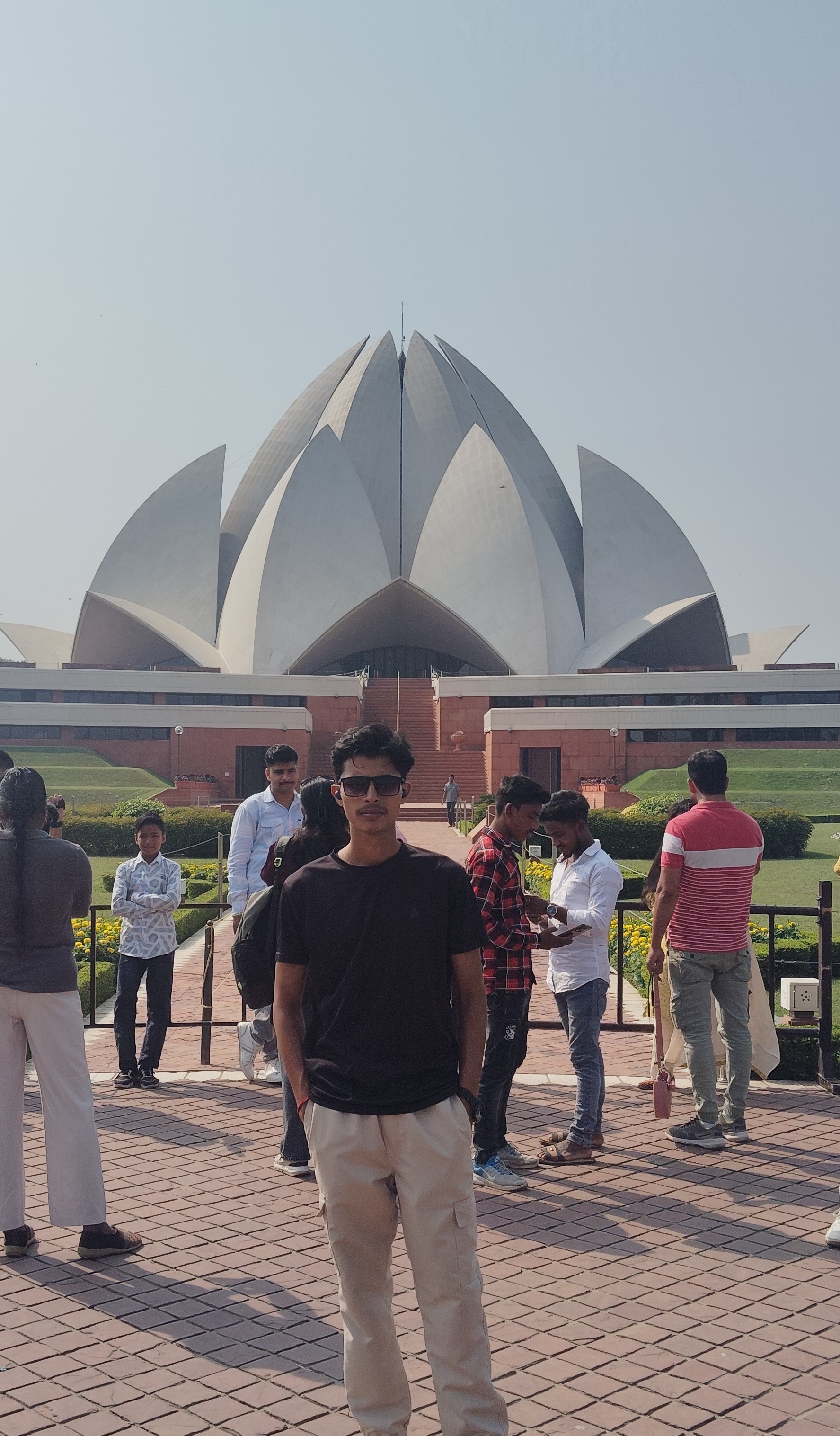 Ashish Alam Kabir standing in front of the Lotus Temple