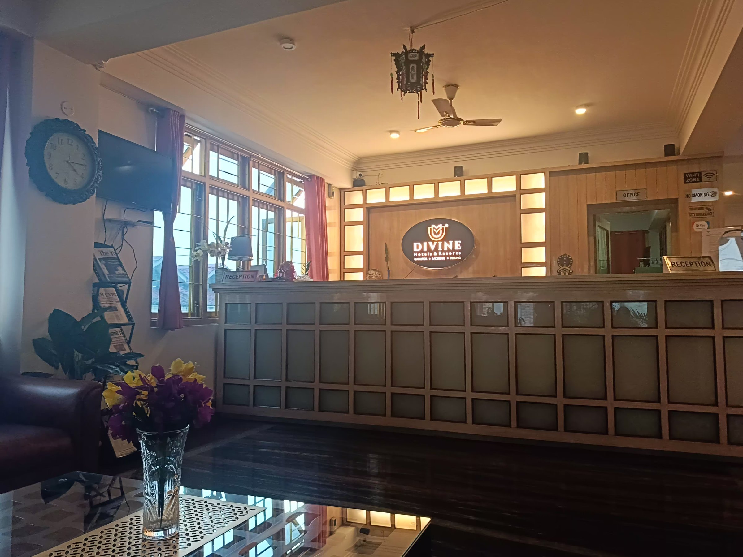 Warmly lit hotel reception in Gangtok